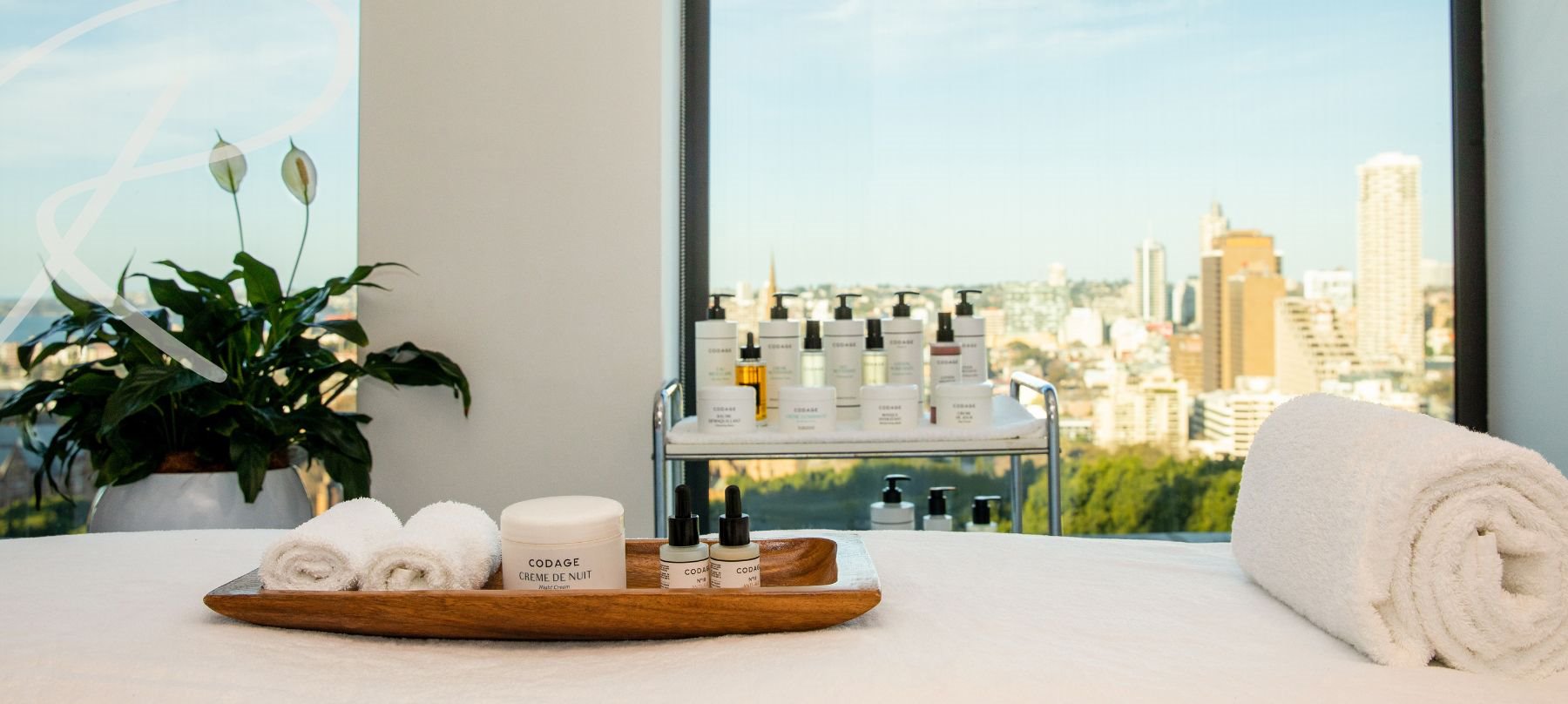 The massage treatment room at The Shertaon Grand, view of equipemnt and of Sydney